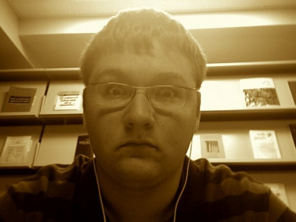 A sepia tone washed out self-portrait of this blog’s author